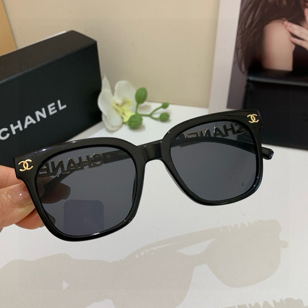 CHANEL Black Sunglasses with Gold Detailing - Picture 7 of 8